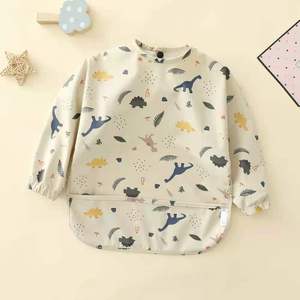 Bavoir <span class=keywords><strong>en</strong></span> tissu lavable doux à manches longues avec poche, bavoir à enfiler, <span class=keywords><strong>tablier</strong></span> imperméable <span class=keywords><strong>pour</strong></span> l'alimentation des bébés - Product Image 1