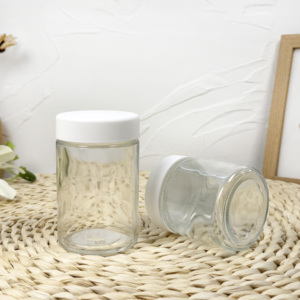 โหลแก้วพร้อมฝาปิดภาชนะกันเด็กทรงกลมสีดำสีขาว - Product Image 1