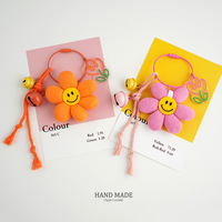 Porte-clés pendentif rond Dongdaemun mignon motif marguerite, tournesol et visage souriant, style Ins, à porter avec des breloques de sac