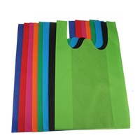 Vente en gros de sacs non tissés en U, coupe réutilisable et écologique, t-shirt uni thermoscellé bon marché, sacs à provisions biodégradables