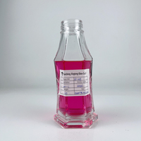 Ventes directes d'usine 350ml 400ml 500ml Bouteille de sauce piquante en verre vide avec couvercle Bouteille de sauce piquante Offre Spéciale en verre avec couvercle en métal