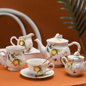 Juego <span class=keywords><strong>de</strong></span> Taza y Platillo <span class=keywords><strong>de</strong></span> <span class=keywords><strong>Porcelana</strong></span> con Relieve Antiguo Europeo, Diseño <span class=keywords><strong>de</strong></span> Limón y Mariposas, Estilo Pastoral Inglés para el Té <span class=keywords><strong>de</strong></span> la Tarde, Apto para Alimentos - Product Image 1
