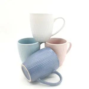 Venda quente cerâmica esmalte copo cor esmalte novo osso china gravado caneca atacado rosa azul cerâmica caneca