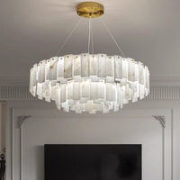 Lustre de luxe moderne Tyson lampes suspendues ovales d'intérieur avec anneau de flocon de neige en albâtre naturel pour hôtel salle à manger salon