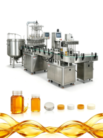 Machine de remplissage et d'emballage de jus pour la production des petites entreprises avec systèmes automatiques de formage et de scellage de cartons.