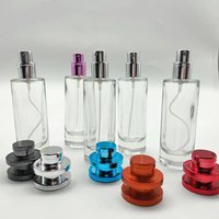 Vente en gros de flacons de parfum en verre de 30 ml avec couvercle rond en plastique UV coloré et pulvérisateur à pompe, vides et rechargeables
