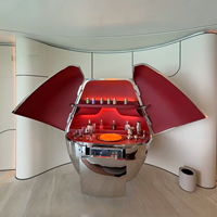 Armoire à vin motorisée de luxe moderne en acier inoxydable, bar à capsules électrique créatif en forme d'aile de mouette pour villa et club