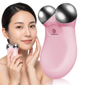 เครื่องนวดหน้าพกพาสีชมพูพร้อมลูกบอลสแตนเลส ชาร์จผ่าน USB อุปกรณ์ยกกระชับใบหน้าสำหรับการบำบัดด้วยการสั่นสะเทือนเพื่อกระชับผิวบริเวณลำคอ - Product Image 1