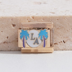 สร้อยข้อมือชาร์ม LA ชุบทอง 18k PVD  สแตนเลสอิตาลี สีชมพู  พร้อมจี้รูปหัวใจ  สร้อยข้อมือชาร์มอิตาลีพร้อมจี้รูปตัวอักษร - Product Image 2