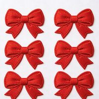 Patchs thermocollants brodés de haute qualité en gros, motif nœud rouge, pour chapeaux, vêtements, sacs et textiles de maison