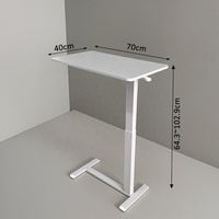 Table basse en métal en forme de T réglable en hauteur pneumatiquement avec roulettes mobiles - Design moderne ergonomique pour salon