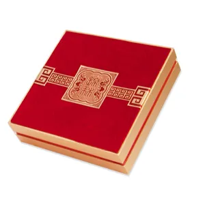 Scatole di imballaggio regalo di lusso portatili pieghevoli con nastro di cartone pieghevole di capodanno cinese stampato all'ingrosso personalizzato con manico