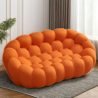 Canapé-lit moderne capitonné rafraîchissant avec tissu à bulles de compression sous vide pour un confort optimal, idéal pour appartement, salon et balcon