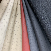 Tissu en vinyle artificiel perforé en PVC de qualité supérieure, cuir synthétique durable en rouleau pour la fabrication de sièges de voiture de course, la décoration intérieure