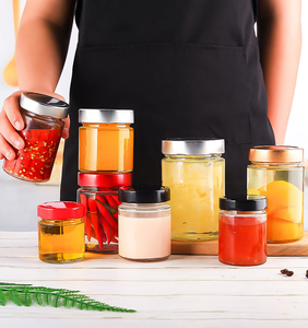 Vente en gros de petits <span class=keywords><strong>pots</strong></span> ronds de stockage de <span class=keywords><strong>confiture</strong></span> en verre 100ml-500ml <span class=keywords><strong>pots</strong></span> en verre alimentaire en verre avec couvercle de couleur personnalisé étiquette OEM - Product Image 2