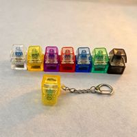 Porte-clés anti-stress lumineux à LED avec clavier mécanique et bouton de clic, jouet sensoriel pour clavier