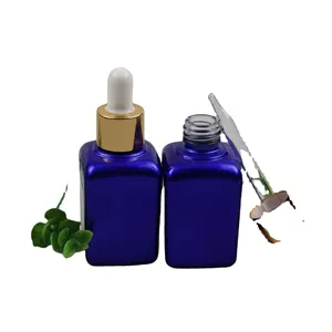 Essential oil packaging 30ml clear green blue amber glass dropper bottle with childproof cap
