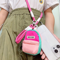 Nouvelle Pochette Tendance Mini Porte-Monnaie Triangulaire avec Porte-clés, Support pour Écouteurs en Polyester, Rangement Compact de Voyage pour Marques de Détail