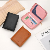 Nouvel étui de voyage en cuir PU pour passeport, avec blocage RFID, sac familial pour passeports et certificats, porte-cartes de banque portable