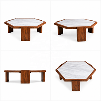 Table basse hexagonale moderne de luxe 55 pouces avec plateau en marbre et pieds sculpturaux en bois massif pour projets de villas et d'hôtels