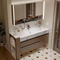 Nouvelle combinaison d'armoires de salle de bain de style moderne, style chinois nouveau, style médiéval, avec lavabo en céramique sans joint en plaque de roche