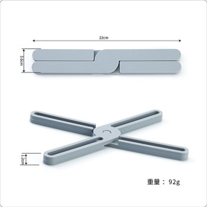 Tapis de cuisine en silicone en forme de croix, 22 cm, pliable, résistant à la chaleur, antidérapant, pour une utilisation en cuisine - Product Image 1