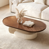 Table basse en bois moderne et minimaliste pour petit salon, design créatif tendance en forme de crème pour le visage