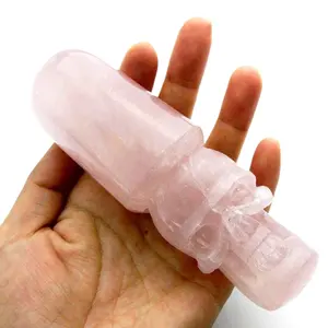 Varita de masaje de cristal de cuarzo Natural, calaveras de cristal tallado de Rosa en venta