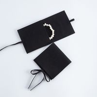 Pochette carrée de luxe en microfibre avec rabat et nœud papillon pour bijoux, badges, colliers, bracelets et bagues