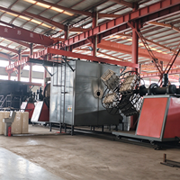 Machine de rotomoulage de type navette pour la fabrication de barrières routières