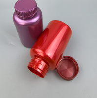 Flacon de complément alimentaire personnalisé avec finition nacrée métallique, bouchon à vis sécurité enfant, contenants vides en plastique pour emballage de capsules alimentaires