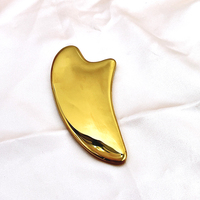 Planche Gua Sha en acier inoxydable 304 en forme de corne de bœuf, design incurvé, pour lifter la texture de la peau, réduire les ridules, outil de soin corporel
