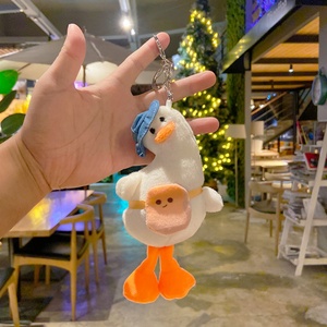 ตุ๊กตาเป็ดน้อยน่ารักห้อยกระเป๋าเป้สะพายหลัง ตุ๊กตาแต่งงานขายส่ง ตุ๊กตาเป็ดหัวเอียงเติมน้ำมัน ตุ๊กตาเป็ดพวงกุญแจ - Product Image 4