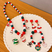 Ensemble de bijoux de Noël pour enfants, collier perlé mignon avec motif de Père Noël et de renne, boucles d'oreilles à clip, bague, cadeau de fête de Noël pour filles