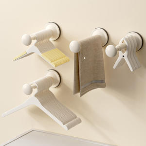 Porte-vêtements télescopique mural à ventouse pour balcon, sans perçage, design en X - Product Image 1