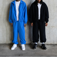 Ensemble de survêtement en nylon personnalisé pour fabricants : veste et pantalon de jogging, coupe oversize, coupe-vent softshell uni et vierge