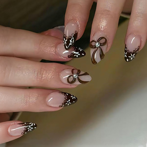 30 faux ongles à presser en amande, motif nœud 3D français, simples et élégants pour usage quotidien, vente en gros - Product Image 1