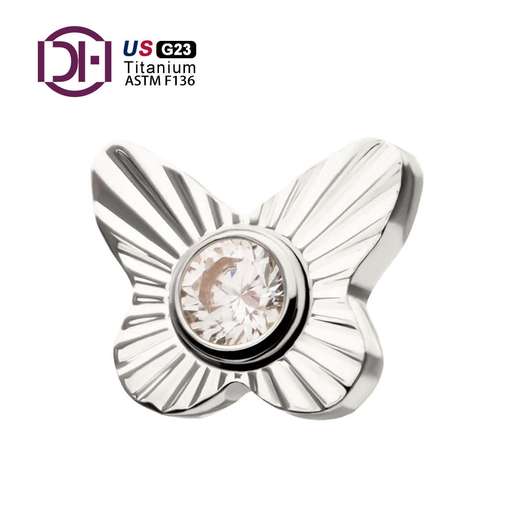 Papillon en titane naturel avec gemme