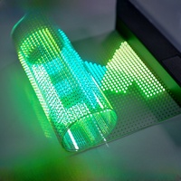 Écran transparent LED flexible à grille couleur intégrale pour vitrine de centre commercial en verre, vente en gros