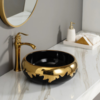 Lavabo de salle de bain en céramique émaillée noire électroplaquée or de qualité hôtelière, lavabo moderne, lavabo d'art moderne, lavabo de comptoir plaqué or