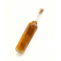 Bouteille à liqueur élégante en verre transparent gaufré avec bouchon en liège 550ml/700ml/750ml pour whisky, brandy et spiritueux haut de gamme