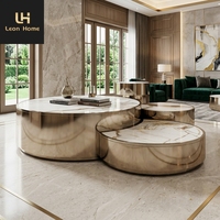 Table basse nordique minimaliste dorée au design moderne et luxueux avec finition en marbre haut et bas pour petit salon familial