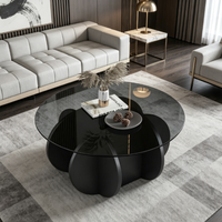 Table basse ronde minimaliste avec plateau en verre transparent et pieds croisés en bois, table compacte de style nordique pour salon