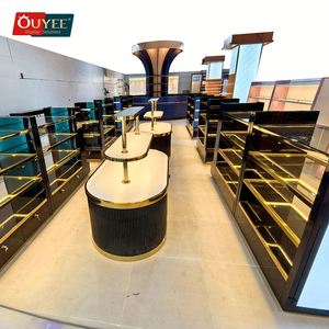 Tienda de perfumes 3D, diseño de interiores, soporte de exhibición de Perfume de acero inoxidable dorado de lujo, estantes de fragancia de vidrio, mesa de exhibición de Perfume - Product Image 1