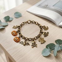Bracelet d'Halloween personnalisé finition antique vintage, main squelette sculptée, ornements en émail multicolores, traitement anti-ternissement