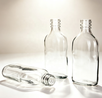 Bouteilles en verre transparent haute qualité pour jus et boissons, multi-capacités, plates, en verre blanc, vente en gros directe usine