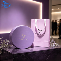 Coffret Cadeau Cylindrique Luxe Violet avec Logo Personnalisé Estampage à Chaud Matériaux Recyclés Écologiques Finition Mate pour Cosmétiques et Soins de la Peau
