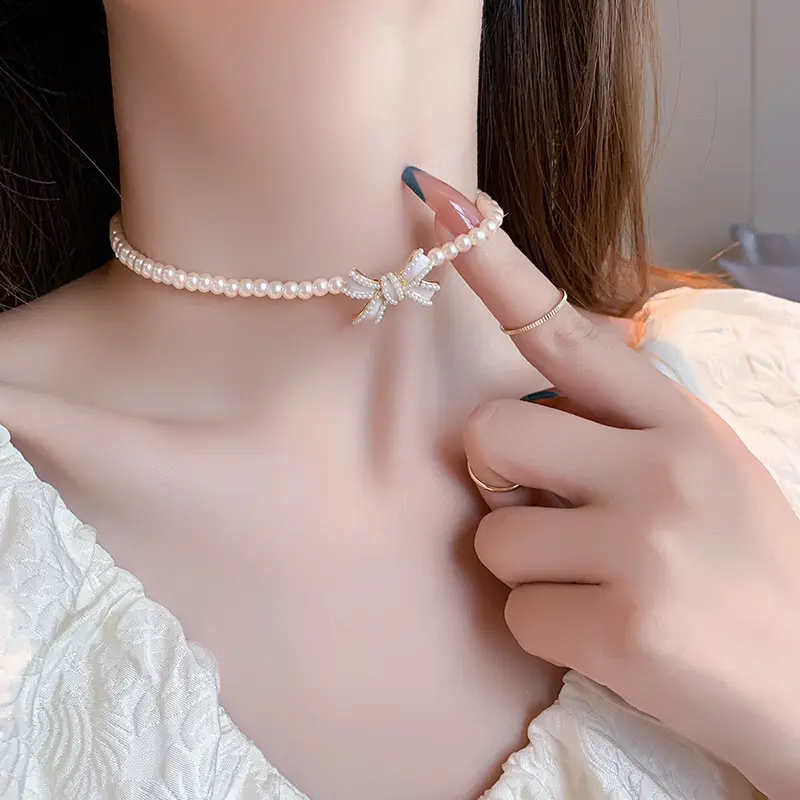 Ins coreano agua dulce perla pajarita cuentas collar joyería perla arco gargantilla Collar para mujer nupcial