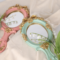 Luxe Européen Portable Ovale En Relief Rose Voyage Princesse Métal Cosmétique De Poche Maquillage Vintage Main Miroirs Avec Poignée