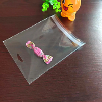 Sac en plastique BOPP auto-adhésif de taille personnalisable avec OPP transparent transparent pour l'emballage de vêtements et de cadeaux thermoscellable